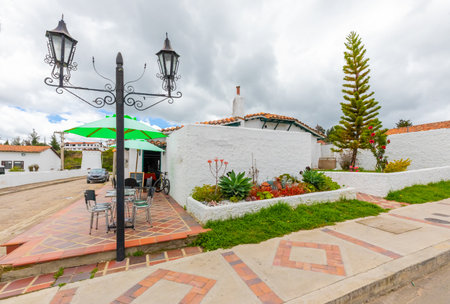 Guatavita,  Colombia June 16 Colonial houses in the historic center of Guatavita. This village was built in 1590 by the spanish. Its buildings are all white well kept and located in a pedestrian area. Shoot on June 16, 2019のeditorial素材