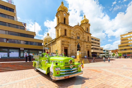 Duitama Colombia May 18 Frontal view of St Lawrence Cathedral in Duitama historic center during an exposition of old fire brigade truck. Shhot on May 18, 2019のeditorial素材