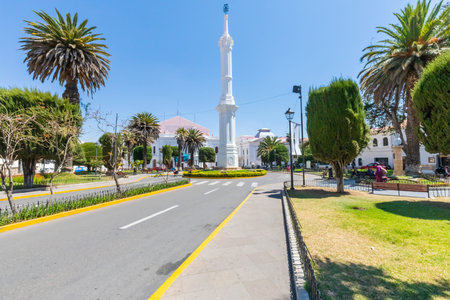 Sucre Bolivia September 29 people relax in the shade of the beautiful palm trees in Liberty Square...