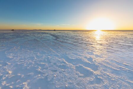 Bolivia Uyuni sunset in the salar panoramic viewの写真素材