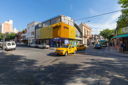 Cordoba Argentina January 4 Belgrano avenue with its restaurants and beers houses in Guemes district in the South of the city at sunset. Shoot on January 4, 2020のeditorial素材