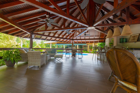 Panama David May 22, American bar under a large wooden gazdebo with modern furnishings, swimming pool and tropical vegetation. Shoot on May 22, 2021のeditorial素材