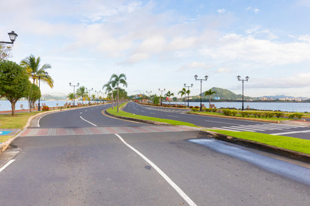 Panama, September 8, road on the Isthmus of Amador at sunrise and on the horizon the Las Americas bridge at the entrance to the canal. Shoot on September 8, 2021のeditorial素材