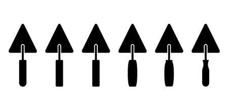 Cartoon masonry trowel, hand trowel for brickwork. Brick laying, brick wall and trowels. Construction vector icon or logo. Set of bricklayer and stucco trowels. Cement trowel, plastering trowel.のイラスト素材