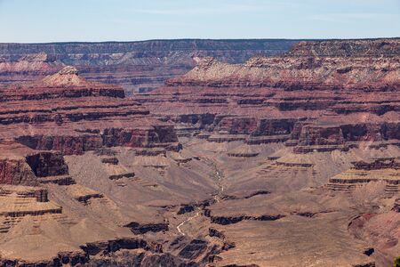 South Rim Grand Canyon carved by the Colorado River in Arizona, has layered bands of red rock revealing millions of years of geological history.の写真素材