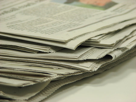 Stacked newspapers