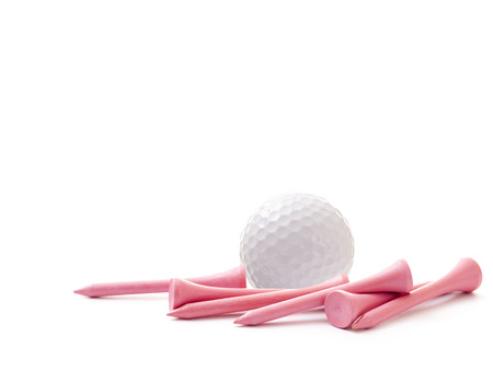 White Golf Ball with Pink Tees on White Backgroundの写真素材