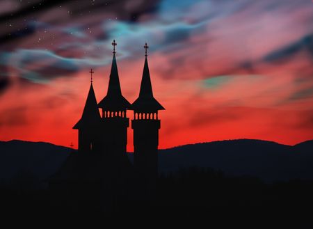 The night falls over an old fashioned European orthodox Church.の写真素材