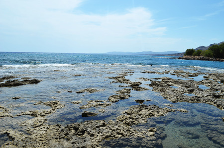 Photo taken at the edge of one of the hotels, view of the small mountains by the sea.の写真素材