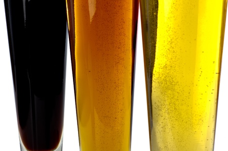 Beer decisions.  Colorful assortment of three beers shot on a white background.の写真素材