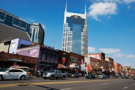 NASHVILLE - MARCH 23: Street view of Lower Broadway Area on March 23, 2014 in Nashville, Tennessee, USA.  The district is famous for the numerous country music entertainment establishments.のeditorial素材