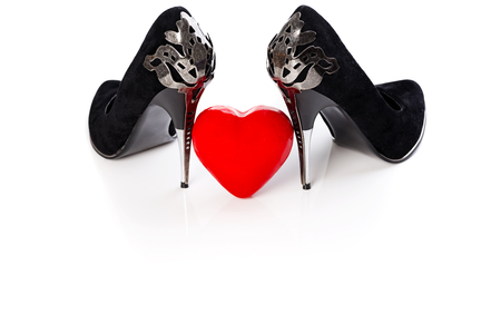Black High Heels And Red Wax Heart On White Reflective Background. Valentine Day, Love Concept.の写真素材