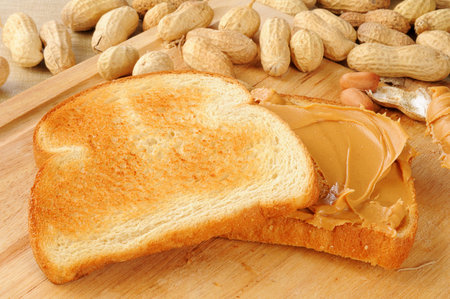 A peanut butter sandwich on toast