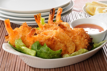 Anappetizer of coconut shrimp with sweet sauceの写真素材