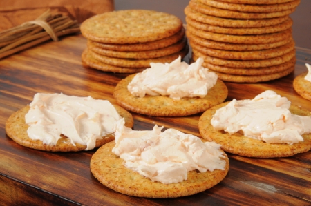 Whole wheat crackers topped with salmon cream cheeseの写真素材