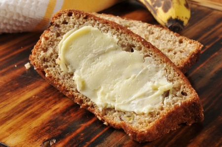 Slices of fresh baked buttered banana breadの写真素材