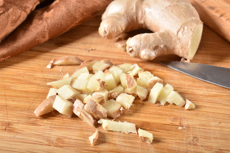 A mound of chopped fresh organic ginger rootの写真素材