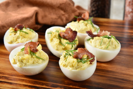 Deviled eggs with chives and bacon bits