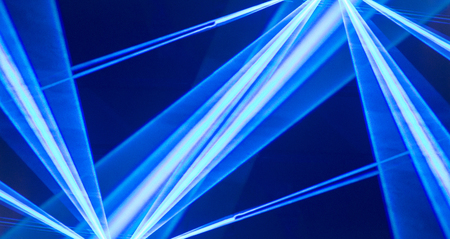 Beams of laser light crossing each other in a discoの写真素材