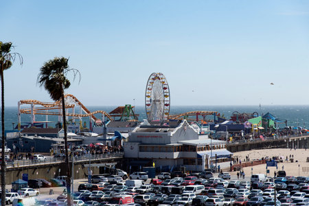LOS ANGELES, CA/USA  - APRIL 11, 2019: Tourists enjoying the Santa Monica Pier and Pacific Park...