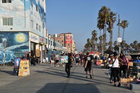 VENICE,  CA/USA - July 5, 2019: Crowds on the Venice Beach boardwalk on the Fourth of July Weekendのeditorial素材