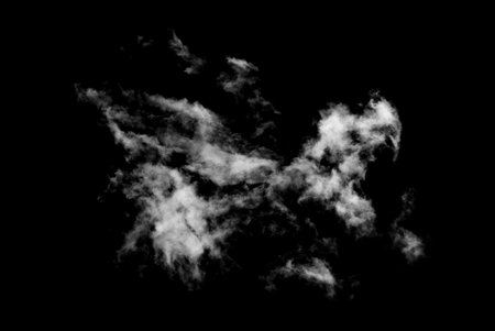 White cloud isolated on black background,Textured smoke,brush effectの写真素材
