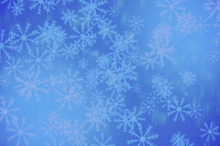 Snowflakes on a blue background. Christmas and New Year background.の写真素材