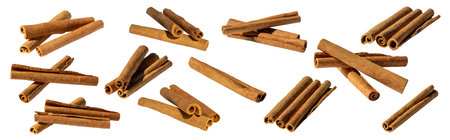 Cinnamon sticks isolated on white background. Top view. Flat lay.