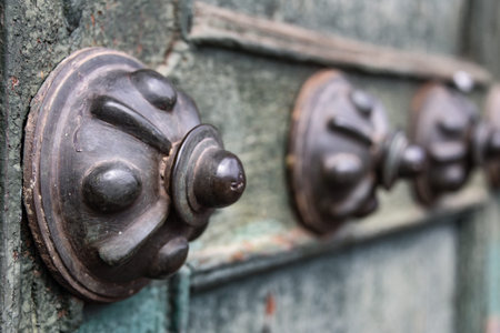 Details of the doors from the historic Iglesia de la Compania in Cusco. Peru.