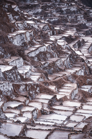 Salinas de Maras, man-made salt mines in the Sacred Valley near Cusco, Peruの写真素材