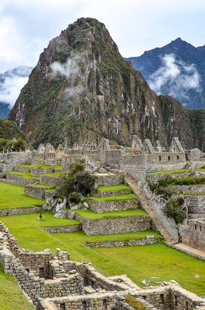 Early morning at Machu Picchu archaeological site in the Andes mountains near Cuzco, Peruの写真素材
