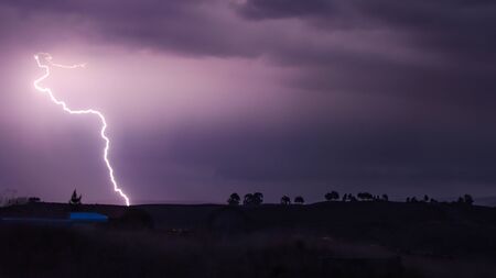 A lightening bolt during a storm in the Andes mountains, Ayacucho, Peruの写真素材
