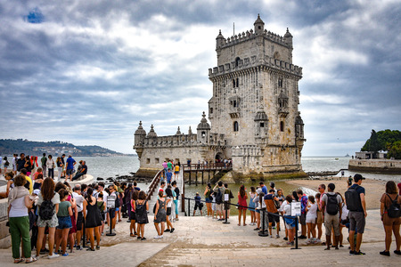 Lisbon, Portugal - July 26, 2019: Crowds of tourists at the entrance to Belem Towerのeditorial素材