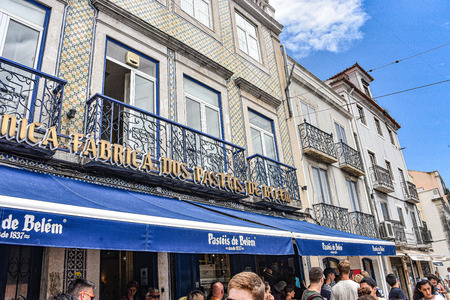 Lisbon, Portugal - July 26, 2019: Crowds of visitors outside the Pasteis de Belem bakery and cafe in Lisbonのeditorial素材
