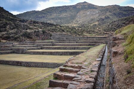 Inca water channels and stone terraces at the Tipon archaeological site, just south of Cusco, Peruの写真素材