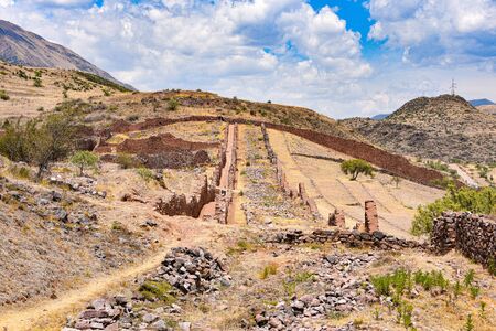Ancient walls and buildings dating back to the Wari culture, at the Pikillacta archaeological site, just south of Cusco, Peruの写真素材