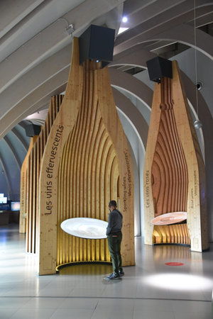 Bordeaux, France - 7 Nov, 2021: Wine exhibits inside the Cite du Vin wine museum in Bordeaux, France