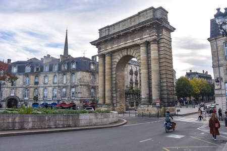 Bordeaux, France - 8 Nov, 2021: Port du Bourgogne, Landmark Roman-style stone arch built in the 1750s as a symbolic gateway to the cityのeditorial素材
