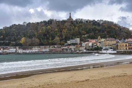 San Sebastian, Spain - Autumn colours over Mount Urgull and La Concha bayの写真素材