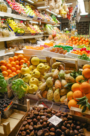 Bologna, Italy - 16 Nov, 2022: Fresh fruit and vegetables on sale in the Mercado delle Erbeのeditorial素材