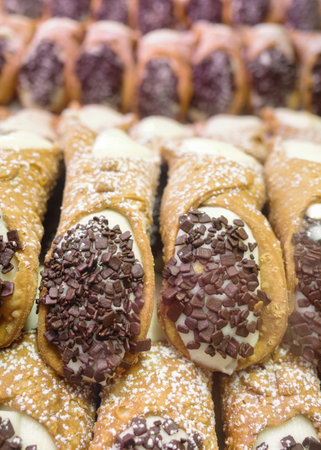 Bologna, Italy - 18 Nov, 2022: Traditional cream filled Cannoli pastriesのeditorial素材