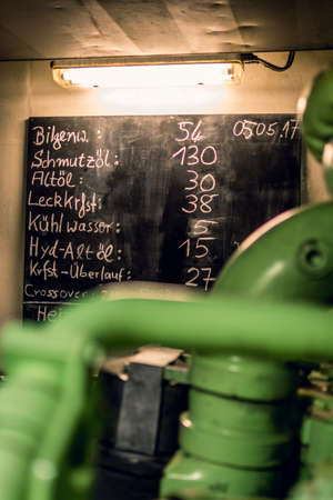 Industrial green ship's engine roomの写真素材