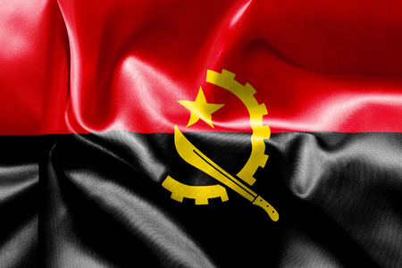 Angola flag texture creased and crumpled up with light and shadowsの写真素材