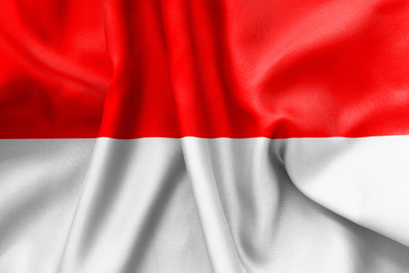 Indonesia flag texture creased and crumpled up with light and shadowsの写真素材
