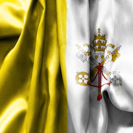 Vatican City flag texture creased and crumpled up with light and shadowsの写真素材
