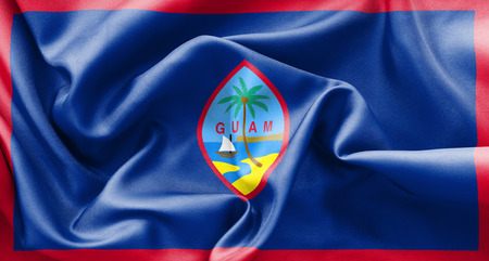 Guam flag texture creased and crumpled up with light and shadowsの写真素材