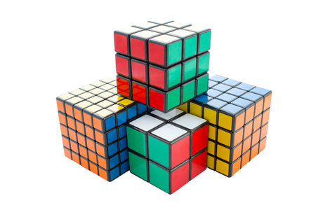 Coventry, West Midlands, UK - Aug 19, 2016: Rubik's style retro puzzle cubes from the 80's solved...