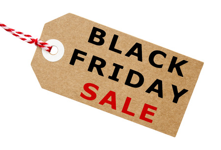 Black Friday sale label made from cardboard with string on an isolated white background with a clipping pathの写真素材