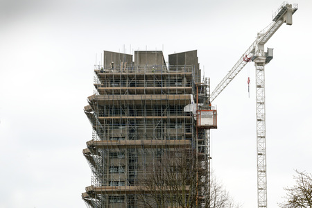 Coventry, West Midlands, UK - April 7, 2018: High rise Priory halls student residents surrounded with scaffolding ready for demolition in Coventry city centreのeditorial素材