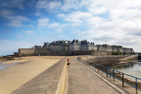 Saint Malo, Brittany, France - July 4, 2017: View of fortress town of Saint Malo from along the breakwater on a cloudy summer dayのeditorial素材